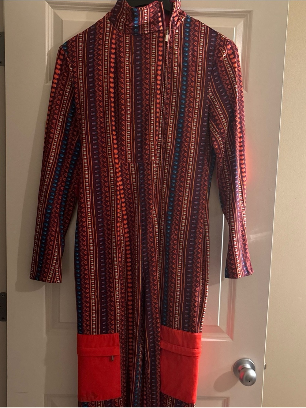 Sassy Jones Orange Geometric Striped High-Neck With wide Leg Jumpsuit